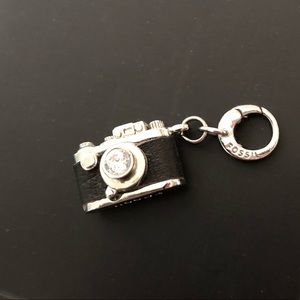 Fossil Camera Charm